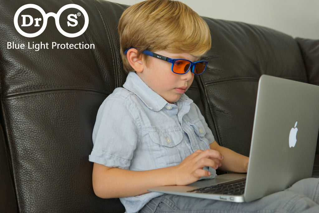 boy wearing kids blue light blockers